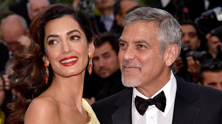 amal and george clooney smiling