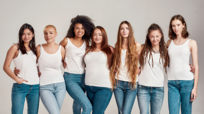 group of women wearing jeans