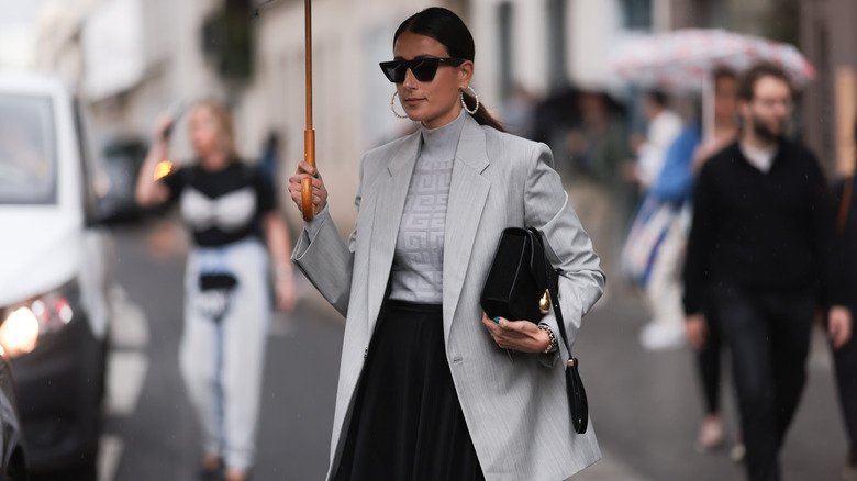 Woman wearing blazer Givenchy outfit
