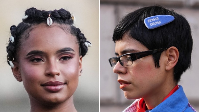 A woman with shells in her hair and one with an oversized barrette