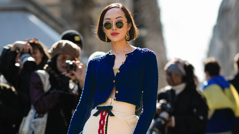 woman with blue cardigan