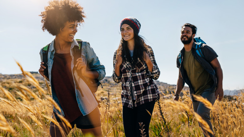 three friends hiking