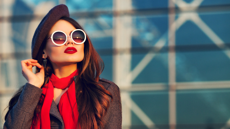 Girl wearing red scarf