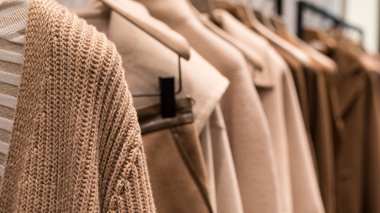 camel winter coats on hangers