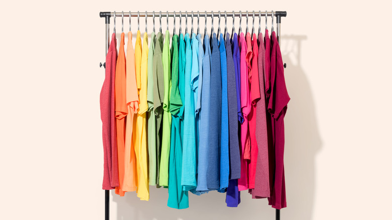 Clothes rack with rainbow of garments