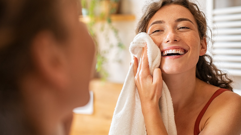 Woman wiping her face 