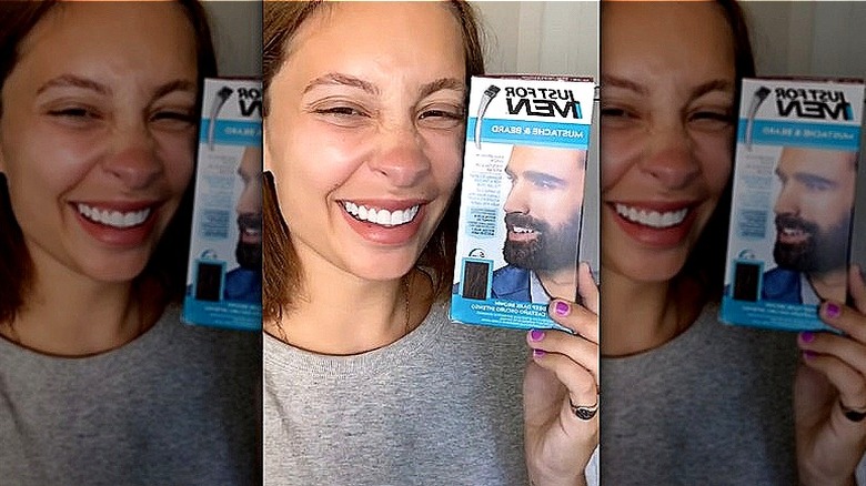 woman holding mustache dye