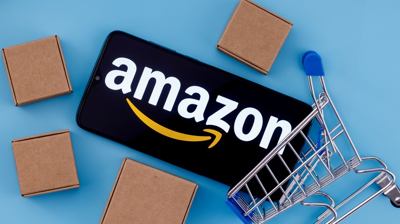cart with amazon logo surrounded by boxes