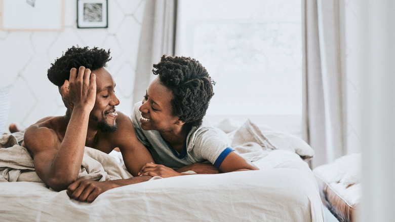 Couple lying in bed