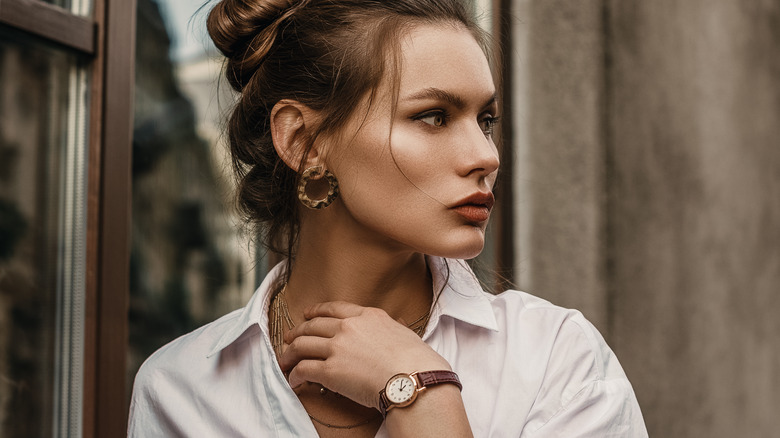 Woman wearing jewelry.