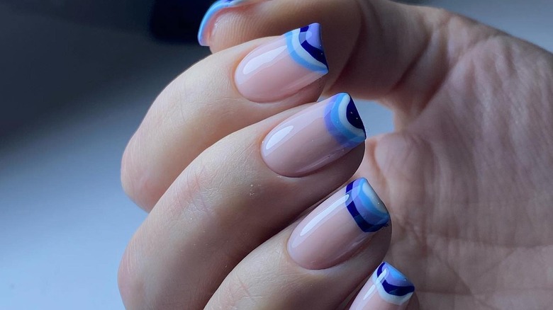 Blue frazzled French nails