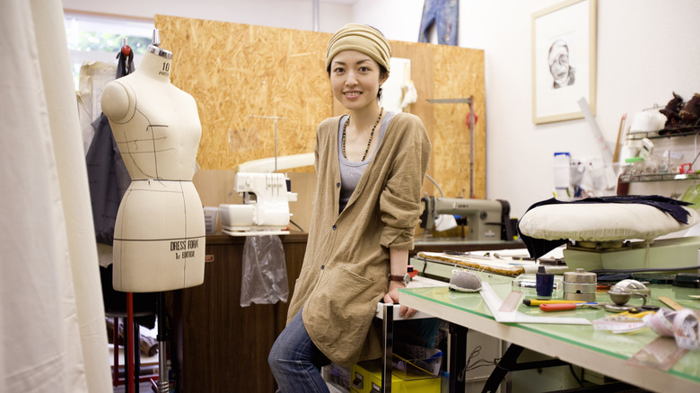 female fashion designer at worktable