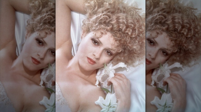 Bernadette Peters poses for a portrait with red curly hair