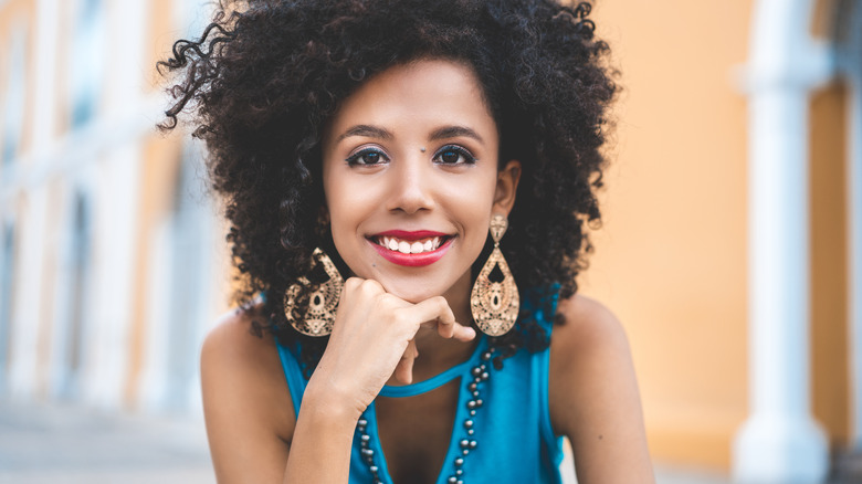 Bright blue shirt red lipstick