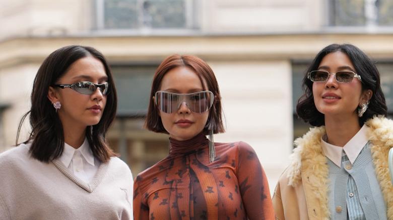 Three women at Paris Fashion Week
