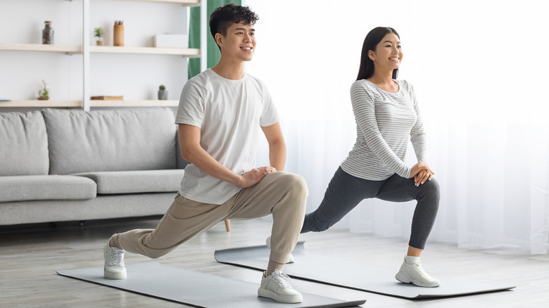 Couple tries yoga together