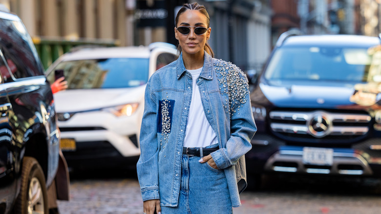 woman wearing denim embellished jacket