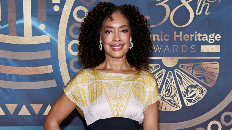 Gina Torres poses for a photo at an award ceremony