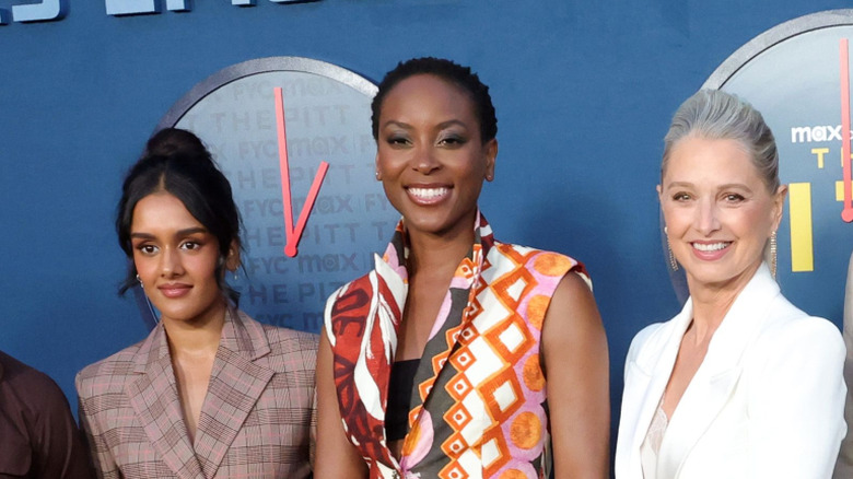 Cast members of The Pitt pose together