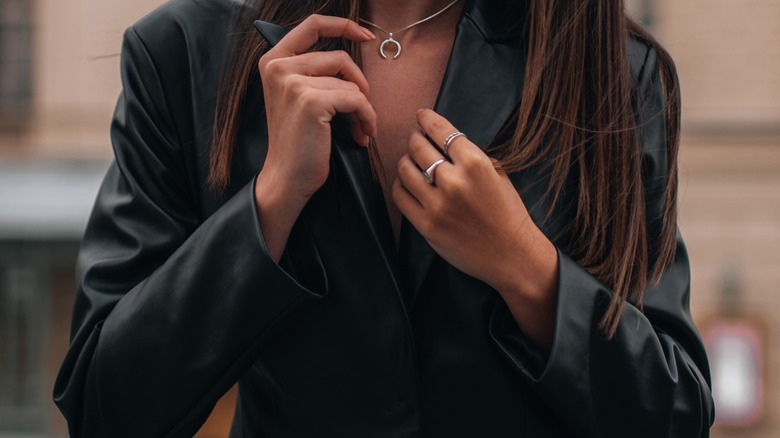 Woman wearing black leather jacket