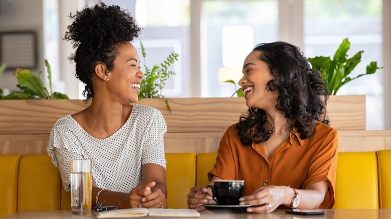 laughing friends in cafe