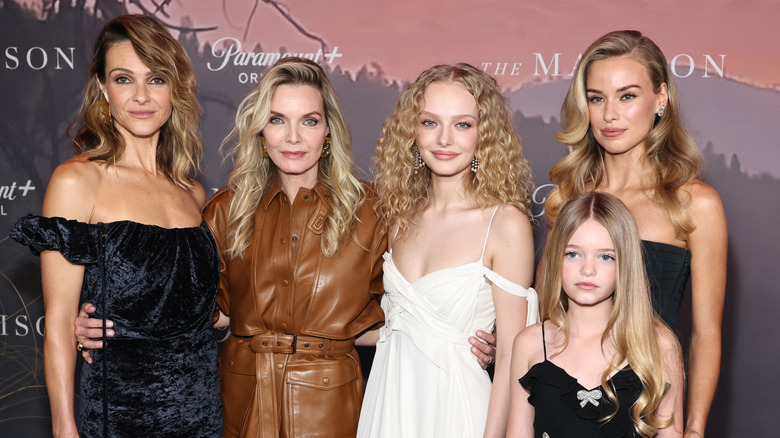 The actors who play the female members of the Clyburn family from The Madison pose at the premiere