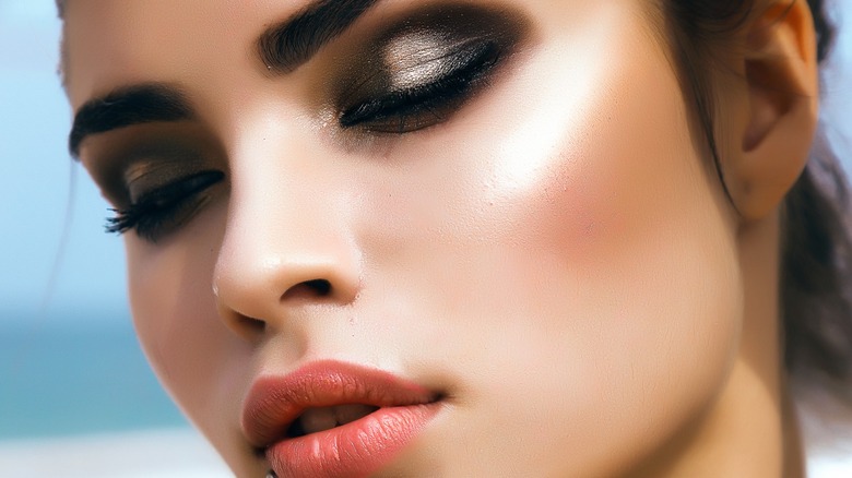 Face with glowing, smooth makeup