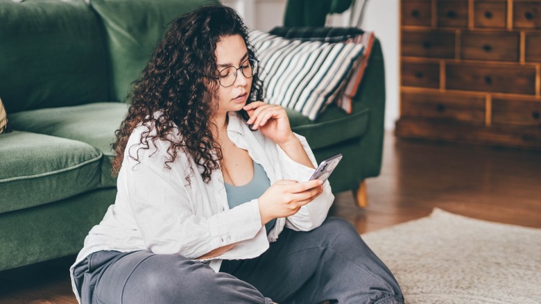 Woman reading her phone