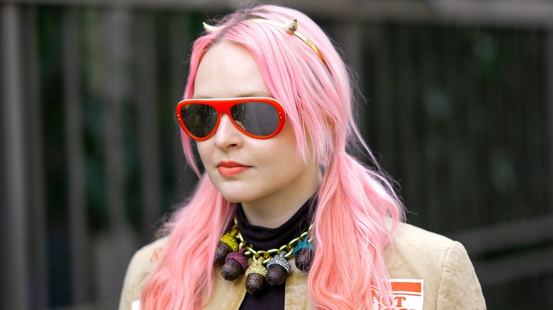 Woman with Millennial pink pigtails