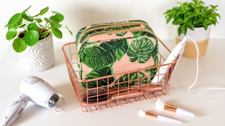 Cosmetic bag in basket 