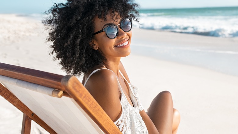 Woman relaxing on the beach