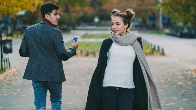 man checking out a woman