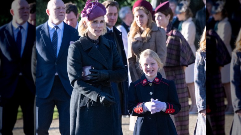 Zara and Lena Tindall walk with royal family members to the Sandringham Christmas services