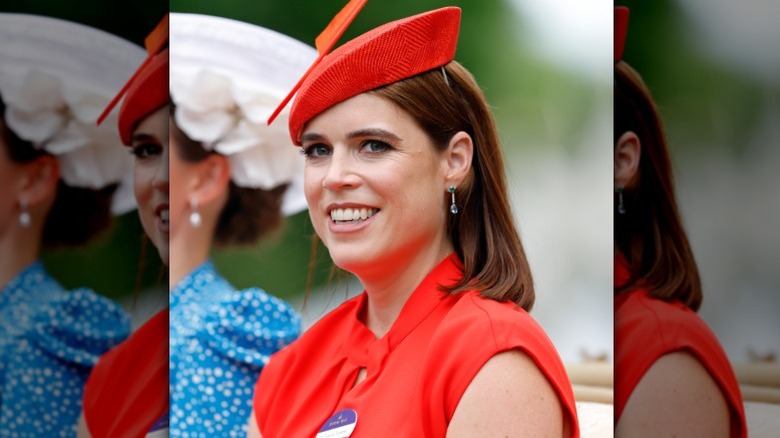Princess Eugenie smiles at a horse race