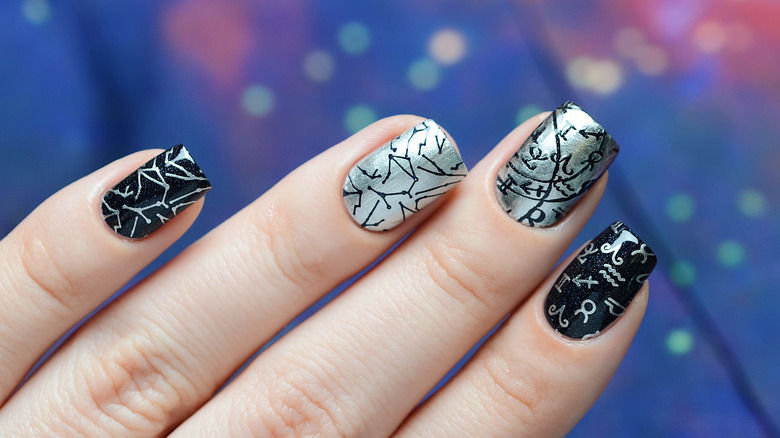 Nails with zodiac sign designs