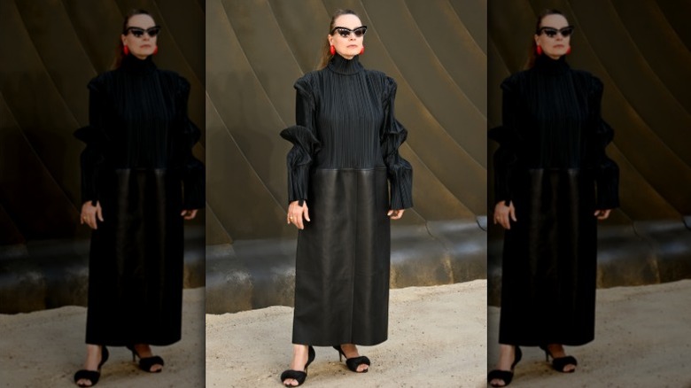 Samantha Morton posing in a black dress from Bottega Veneta