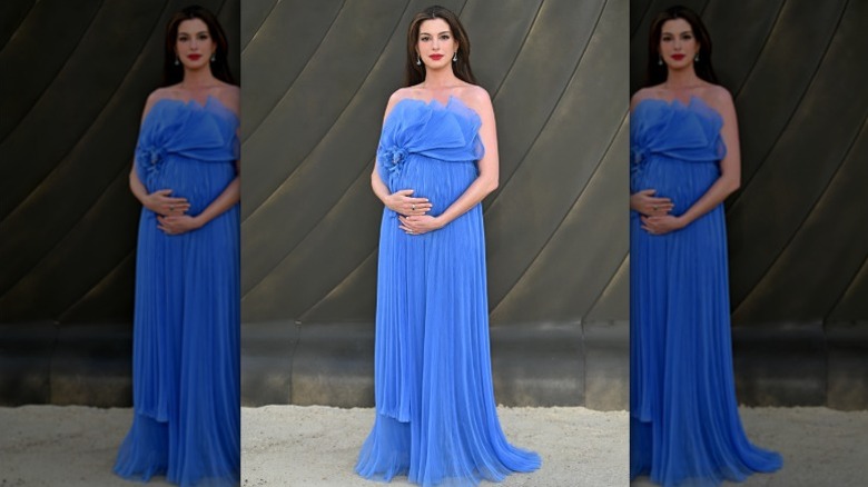 Anne Hathaway in a Grecian-inspired dress as the Odyssey premiere