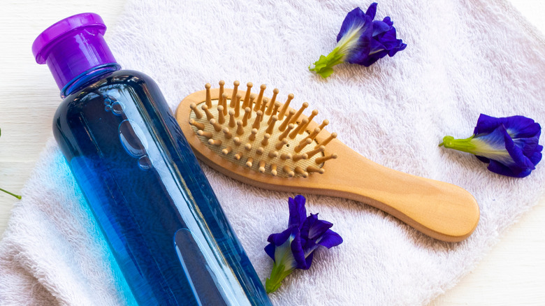 wooden hairbrush with cleaner