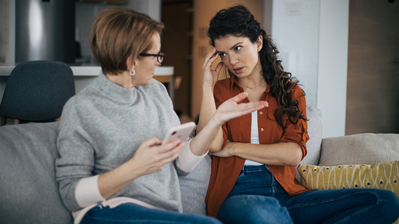 tense woman and mother talking