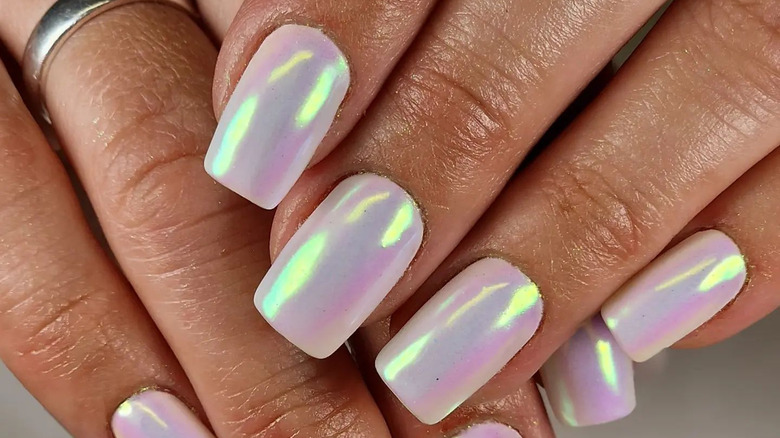 hands with unicorn nails