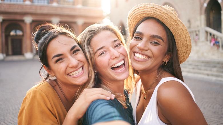 Three women taking a selfie