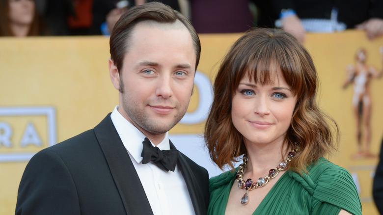 Vincent Kartheiser and Alexis Bledel pose on the red carpet at an awards show in 2013.