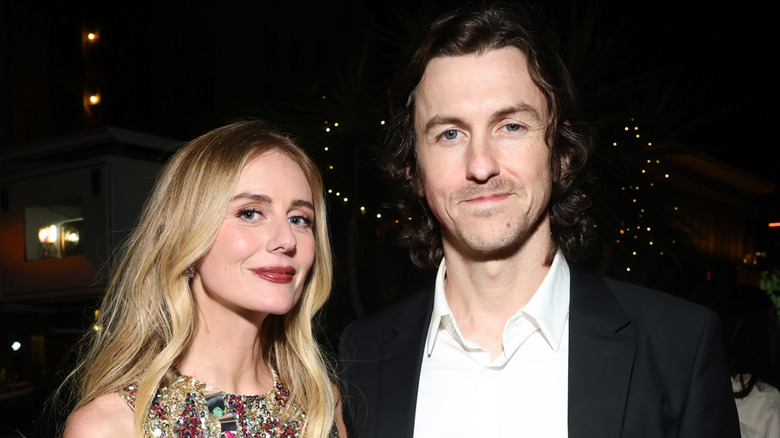 Justine Lupe is photographed with husband Tyson Mason at a press event.