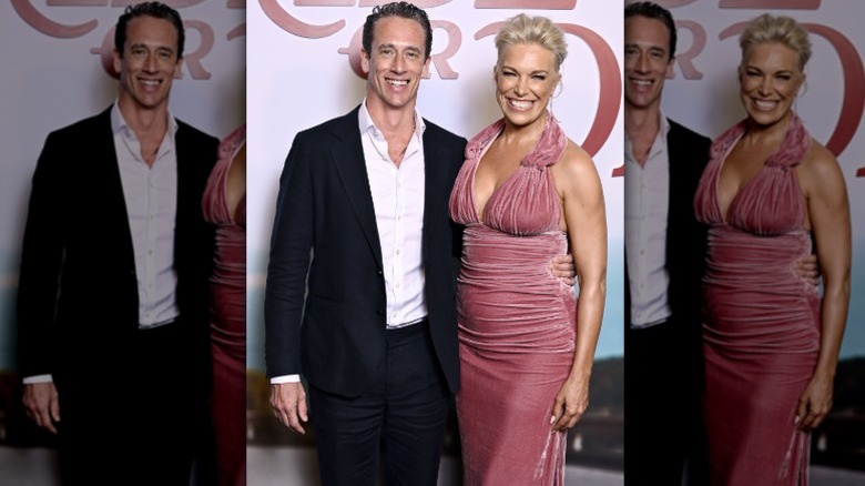 Nick Beresford-Cleary and Hannah Waddingham pose at a premiere