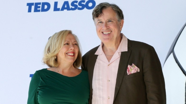 Mary Roscoe and Jeremy Swift pose at the Ted Lasso premiere