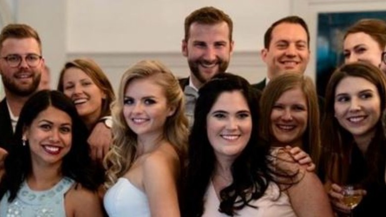 Andrea Brooks, Riley Graydon and friends pose at their wedding