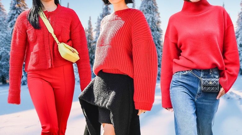Three women wearing red sweaters
