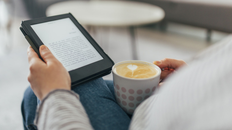 Woman reading Kindle