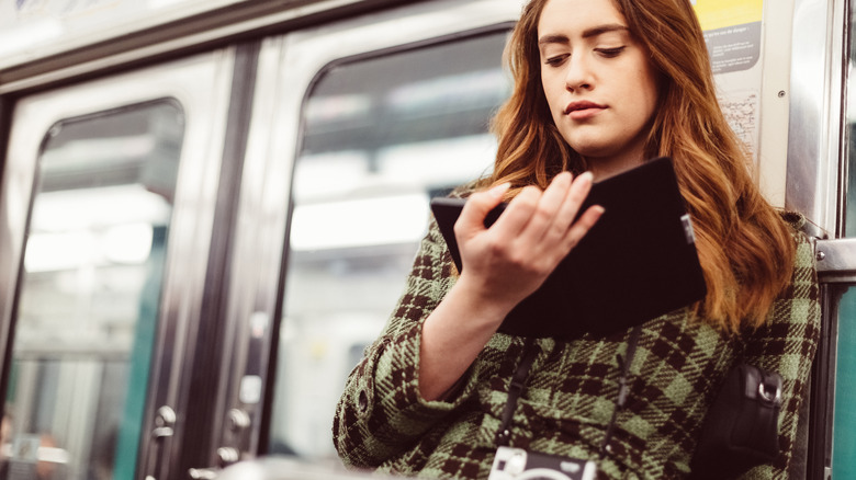 Woman reading e-reader