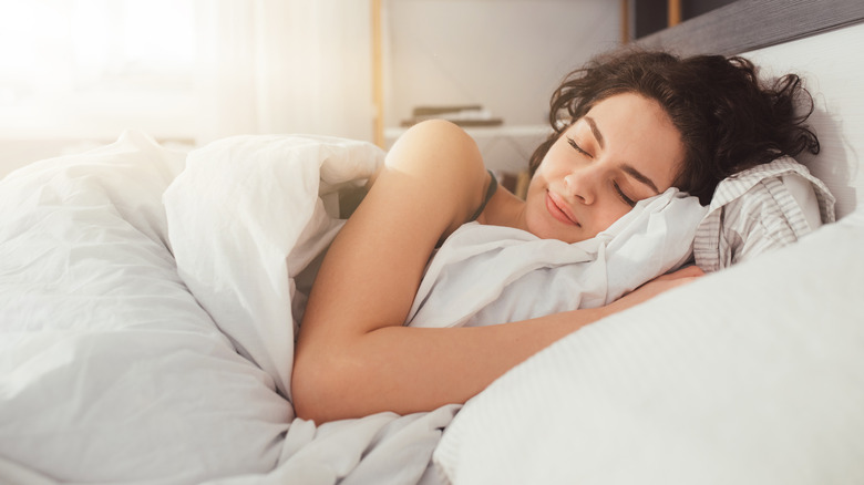 Woman sleeping in bed